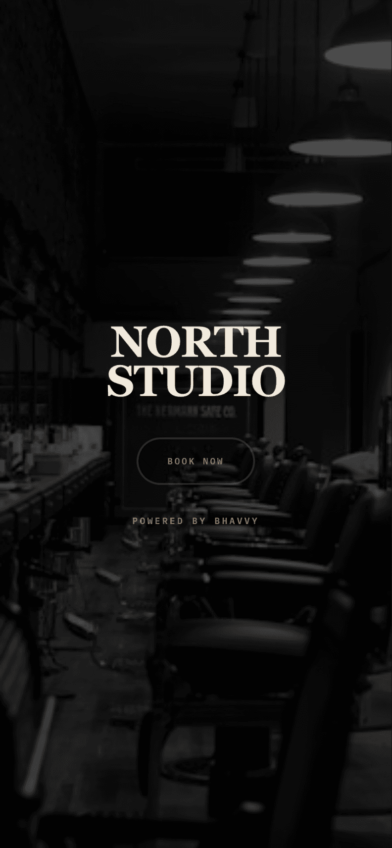 Mobile barbershop homepage with Book Now button